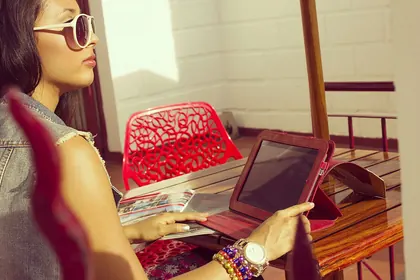 Reading on a tablet outdoors