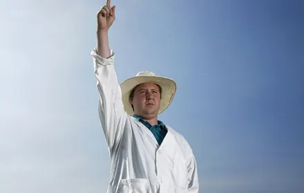 Umpire signalling a dismissal