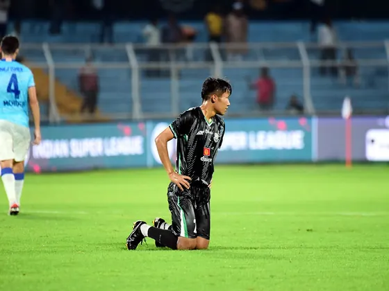 Footballer on the ball in an Indian league match